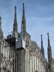 Milan, Duomo, the cathedral of the city during repairing work - obrazy, fototapety, plakaty