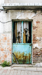 Old door with rusty metal details