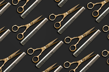 Barbershop background. Hairdressing scissors and a hairbrush on a dark background. Beauty and fashion background.