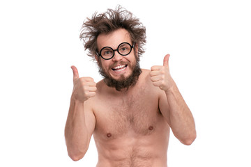 Crazy bearded Happy Man with funny Haircut in eye Glasses making Thumbs up gesture.Cheerful and...