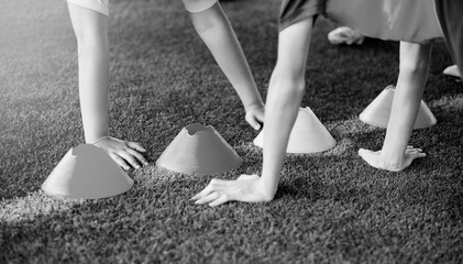 black and white image of hand sensitivity test competition for holding cones