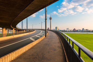 Obraz na płótnie Canvas Düsseldorf Germany Skyline as seen from a Bridge Ramp across the Rhine River