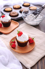 Cupcake with protein cream and strawberries.