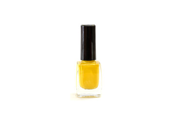 yellow nail polish on a white background