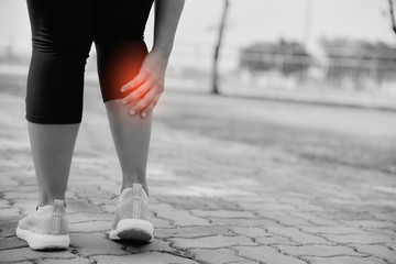 Woman suffering from leg pain, calf pain. Painful in calf of leg. Health care and medical concept. © Skywalker911