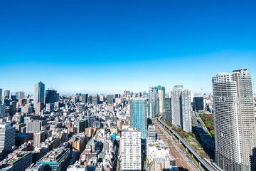 Naklejka na ściany i meble Asia business concept for real estate and corporate construction - panoramic urban city skyline aerial view under blue sky in hamamatsucho, tokyo, Japan