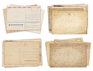 Set of various old vintage postcards isolated on white