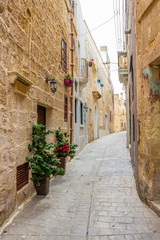 Beautiful typical narrow street in Rabat, Malta, streetscape detail