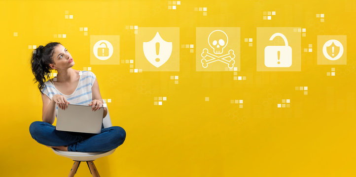 Virus and scam theme with woman using a laptop