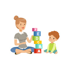 Little boy sitting on the floor and playing with abc cubes with his teacher, preschool education concept vector Illustration on a white background