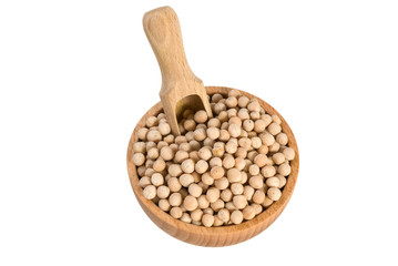 Yellow pea in wooden bowl and scoop isolated on white background. nutrition. bio. natural food ingredient.