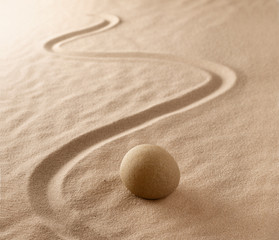 Fototapeta na wymiar Zen stone meditation sand garden. Mindfulness, yoga or spa wellness background.