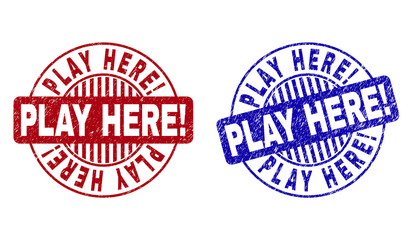 Grunge PLAY HERE Exclamation round stamp seals isolated on a white background. Round seals with grunge texture in red and blue colors. Vector rubber overlay of PLAY HERE Exclamation text inside circle