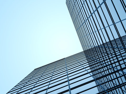 Fototapeta 3D stimulate of high rise curve glass building and dark steel window system on blue clear sky background,Business concept of future architecture,lookup to the angle of the corner building.