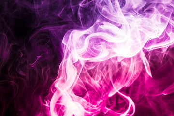 Colored smoke on black background