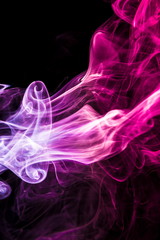 Colored smoke on black background