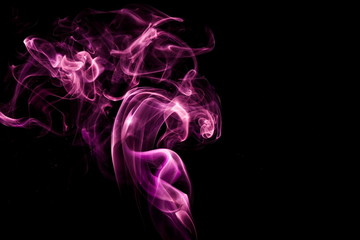 Fototapeta premium Purple smoke on black background