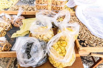 Naklejka na ściany i meble Traditional orecchiette pasta from Italy, for sale in street stalls in the city of Bari for tourists.