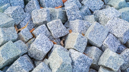 12722_Heap_of_white_small_bricks_covered_in_small_white_stones.jpg