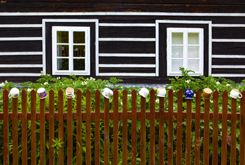 rural planted fence with cups