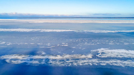 Fototapeta premium 13028_The_frozen_snow_on_the_ocean_in_Estonia.jpg