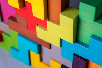 Geometric shapes on a wooden background.