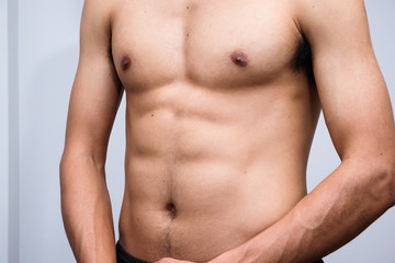 Fototapeta premium Sexy six pack muscular male torso