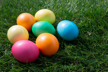 Fototapeta na wymiar Painted Easter eggs on green grass