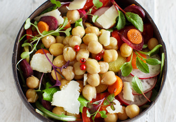 Chickpea salad with vegetables and microgreens