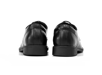 Men’s black shoes isolated on a white background.