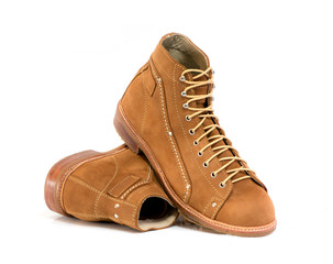 Men’s brown  boot with nubuck leather for man collection isolated on a white background.