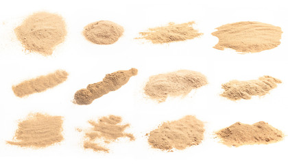 Set of brown sand on white background. grain of sand.