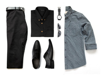 Men's clothing set with black shoes , watch,  trousers, belt, sunglasses and office shirts isolated on a white background, Top view