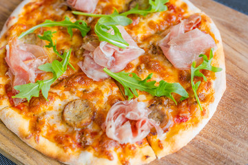 Homemade cheese pizza with salami, delicious pizza with cheddar