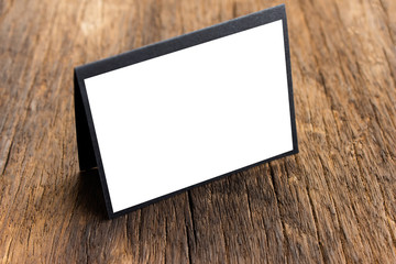 Blank portrait mock-up paper. brochure magazine isolated on brown wooden table, changeable...