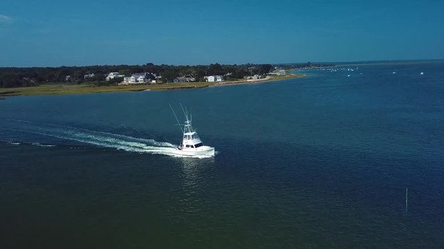 Fishing Boat Leaving Harbor