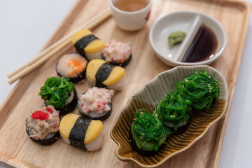Fototapeta na wymiar Sushi Set,Japanese sushi,Sushi on black stone,Japanese sushi on black stone 