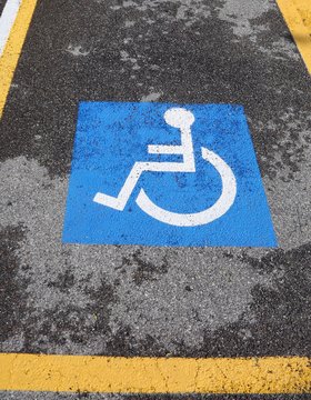 wheelchair symbol on a car parking