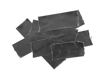 Set of black tapes on white background. Torn horizontal and different size black sticky tape, adhesive pieces.