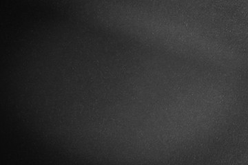Fototapeta premium black paper texture or background with spotlight, dark wall backdrop wallpaper, dark tone.