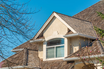 The top of the house or apartment building with nice window