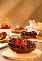 Gourmet easter egg, stuffed with chocolate and strawberry. Easter egg with pudding cream, Easter dessert. Easter concept.