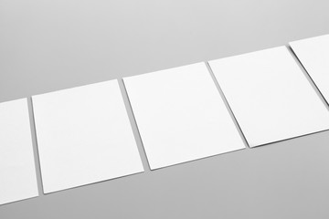 Blank portrait mock-up paper. brochure magazine isolated on gray, changeable background / white...