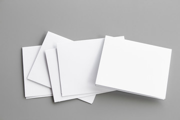 Blank portrait mock-up paper. brochure magazine isolated on gray, changeable background / white paper isolated on gray