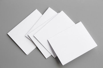 Blank portrait mock-up paper. brochure magazine isolated on gray, changeable background / white...
