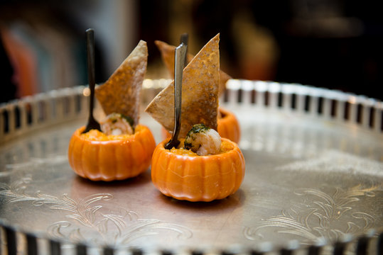 squash, jerimum, mini pumpkin stuffed with shrimp on silver tray, shrimp in the pumpkin, brazilian cuisine, pumpkin cream, food background, shrimp in squash, haute cuisine, silver tray