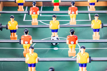 Foosball table soccer .sport teame football players