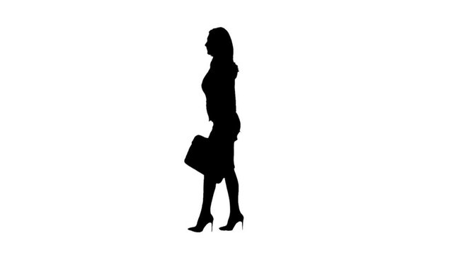 Lady with cases in hands speaks on the phone and step . Side view. White background. Silhouette. Slow motion