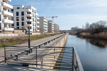 the view of the newly designed Lindenau harbour in Leipzig with its Karl-Heine canal, bridges and...