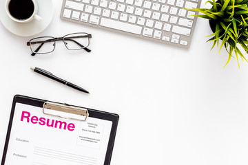 Review resumes of applicants set with coffee, glasses, keyboard white work desk background top view mockup